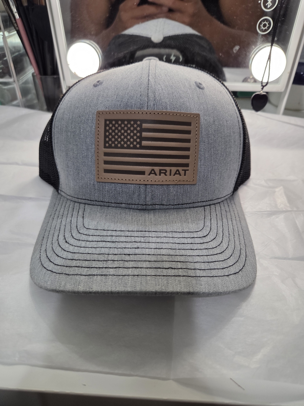 Ariat Light Gray and Black Trucker Cap with Leather Flag Patch